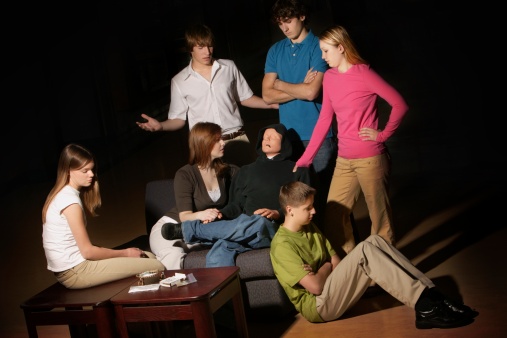 Group of teens having an intervention